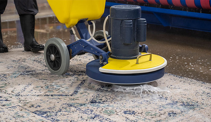 Rug cleaning using equipment